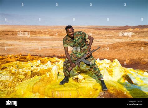 Soldier In Saltwater Lake Dallol Danakil Desert Ethiopia Africa