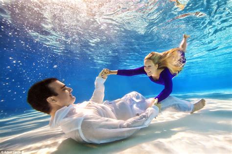 Photographer Adam Opris Captures Clothed Couples Kiss And Pose In Ethereal Underwater Engagement