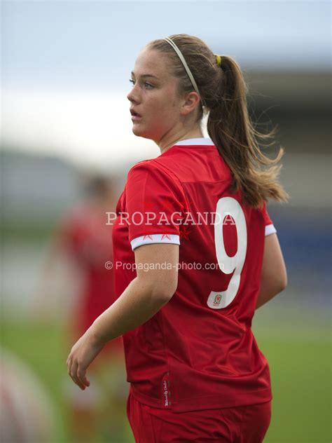 Wales get the ball rolling, their players wearing red shirts, shorts and socks. International Football - Women's Under-17 Friendly - Wales v Denmark | Propaganda-Photo.com