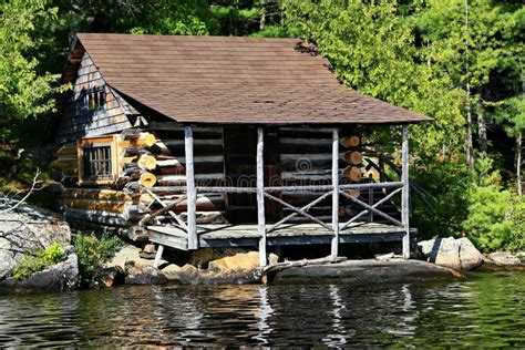 Rustic Log Cabin At Water S Edge Editorial Photography Image Of