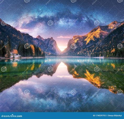 Milky Way Reflected In Water In Mountain Lake At Starry Night Stock