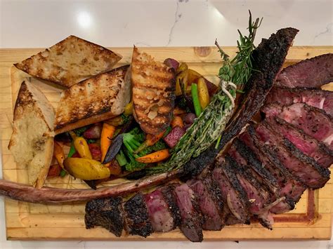 Oz Tomahawk Ribeye With Hearth Roasted Vegetables Dining And Cooking
