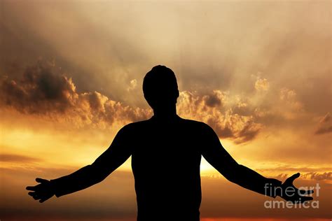 Man Praying Meditating In Harmony And Peace At Sunset Photograph By