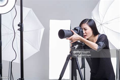 Photographer Taking Picture In Studio High Res Stock Photo Getty Images