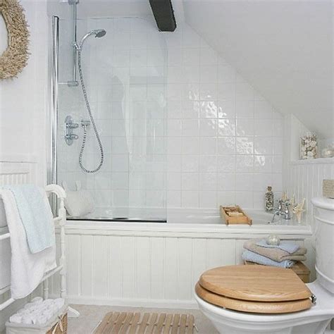 Discover the best small bathroom designs that will brighten up your space and make the whole room feel bigger! Figuring out how to deal with our sloped ceiling...a half shower door? | Small attic bathroom ...