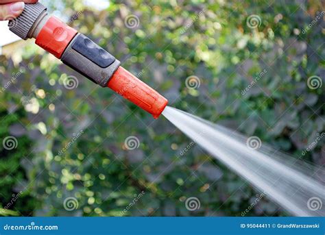 Water Spraying From A Garden Hose Stock Image Image Of Resource Globe 95044411