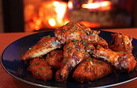 Bake until chicken is golden and skin is crispy, 50 to 60 minutes, flipping the wings halfway through. 21 Finger Lickin' Ways to Make Buffalo Wings - thegoodstuff
