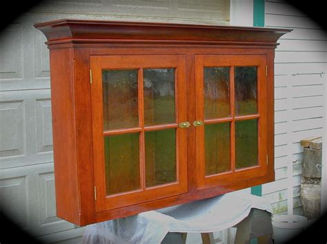 Dutch cabinet company gives you every reason to trust us with your cabinet needs. Custom cherry hanging wall cabinet. Pennsylvania dutch ...