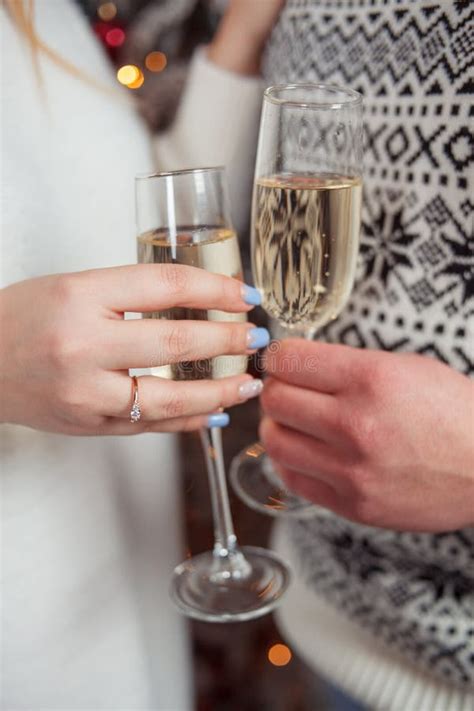 Celebration Hands Holding The Glasses Of Champagne And Wine Making A