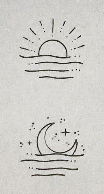 The Sun And Moon Are Drawn On Paper