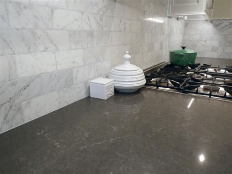 Maybe you would like to learn more about one of these? Piatra Gray quartz countertop with Carrara marble ...