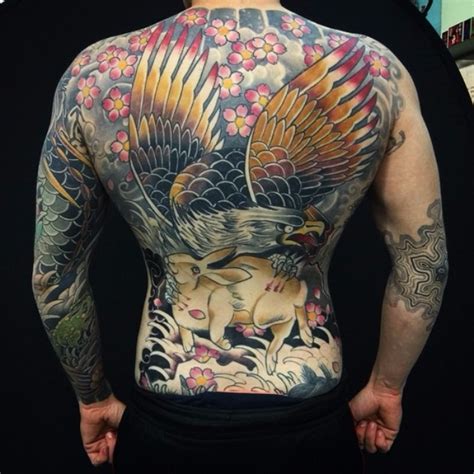 Hare Holding Eagle Full Back Tattoo Best Tattoo Ideas