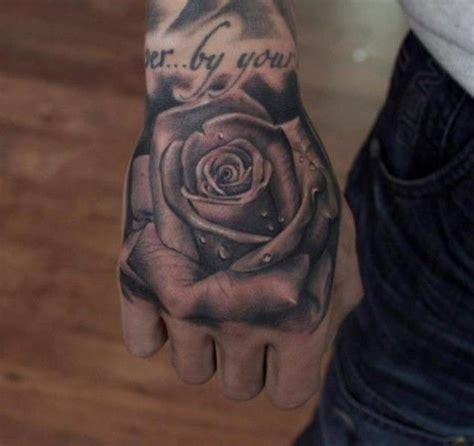 A male and female passenger tra. Rose Tattoos for Men | Rose tattoos for men, Hand tattoos ...