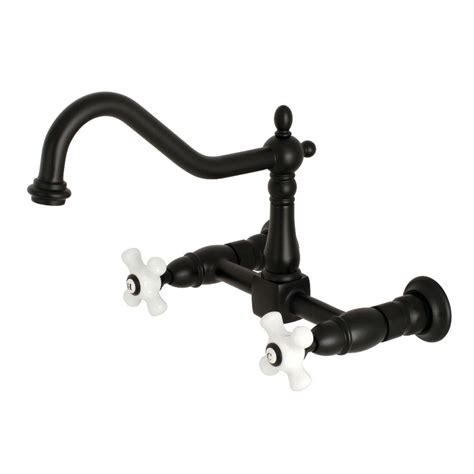 The brass kitchen faucet provides dynamic performance in addition to giving a traditional look to the kitchen. Kingston Brass Heritage 2-Handle Wall Mount Kitchen Faucet ...