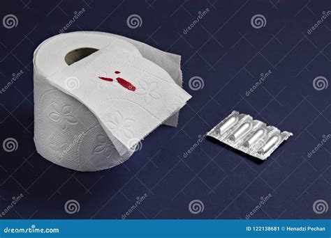 Toilet Paper With Blood And Rectal Suppositories Against Hemorrhoids