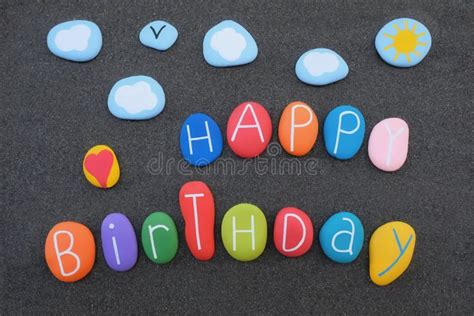 Creative Happy Birthday Text With Colored And Carved Sea Stones Over