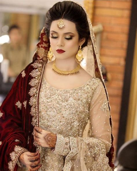 If you're wearing a lehenga, hangbok, or because red is so vibrant, we recommend choosing a slightly muted version of the color and a silhouette that gives tonal depth, like this ruffled tulle gown. White and gold. Always a winner. Pakistani brides | Red ...