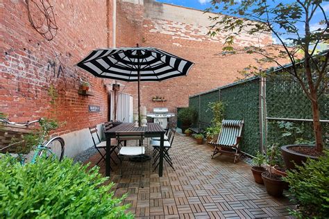 Factory Lofts Condo In Williamsburg Offers A Two Tiered Private Patio