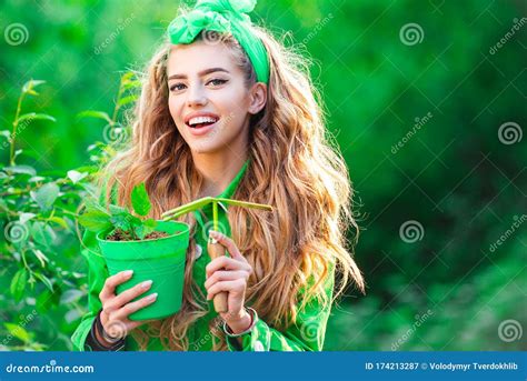 Beautiful Girl Holding A Flower Pot Plants And Gardening As Favorite Hobby Stock Image Image