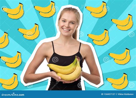 Pretty European Blonde Woman Holding Several Bananas In Her Hands And