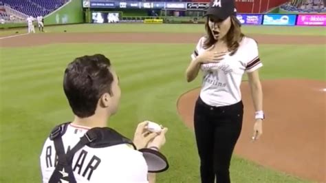 Man Proposes As She Throws Out First Pitch At Miami