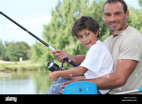 Father And Son Fishing Stock Photo Alamy