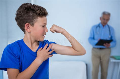 Young Boy Flexing Biceps Stock Photos Download 343