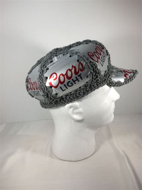 I don't have a pattern :( but what i did was just make a magic circle with 10 stitches and then half double crochet and increased slowly until i got the size i wanted, you can look at bucket hat tutorials on youtube they're really helpful! Coors light beer can hat/ crochet hat | Crochet beer, Beer ...