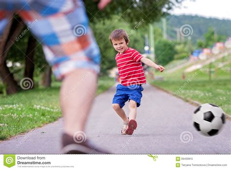 Two Cute Little Kids Playing Football Together Summertime Stock Image