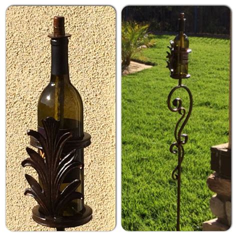 The standing iron torch can hold up to 6 resin at once. Custom Wrought Iron Wine Bottle Tiki Torch Stands! # ...