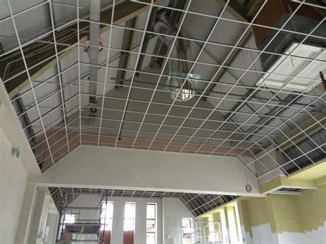 The benefits of installing a suspended ceiling system yourself instead of hiring someone to drywall and finish that same ceiling are: Landville Drywall | Suspended Ceilings (Drywall and T-Bar)