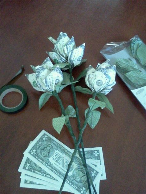 Money origami flower bouquet once you've made your flowers, you can arrange them into a bouquet. 67a01ad83090f3e9f132a087ea4fb528.jpg 540×720 pixels | Money flowers, Money origami, Money bouquet