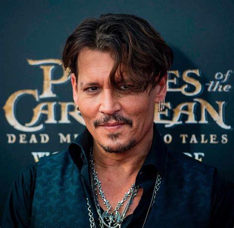 Johnny Depp Dating After Divorce Staying Focused Amid Financial Crisis