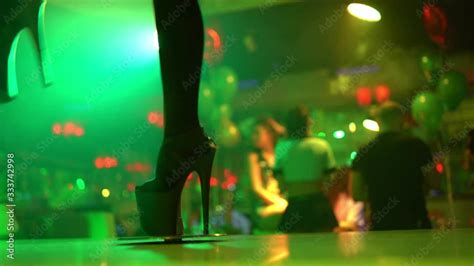 Young Sexy Woman Pole Dancing Striptease With Pylon In Night Club Beautiful Stripper Girl On