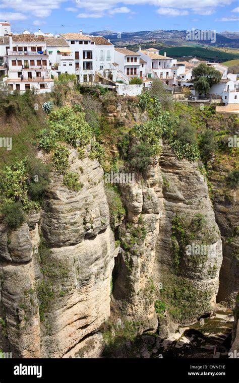 White Houses Of Ronda Town On A High Cliff In Andalusia Region Of Spain