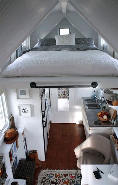 The interior living quarters include a living room, small kitchen and small bedroom. Why a Tiny House Should Be Your Next House