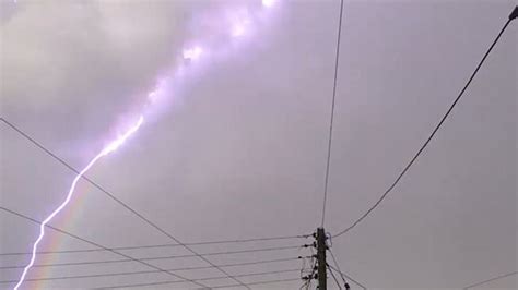 Watch One In A Million Moment Bolt Of Lightning Strikes Curvature Of