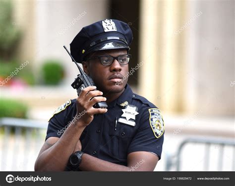 Police Officer Performing His Duties On The Streets Of Manhattan New York City Police