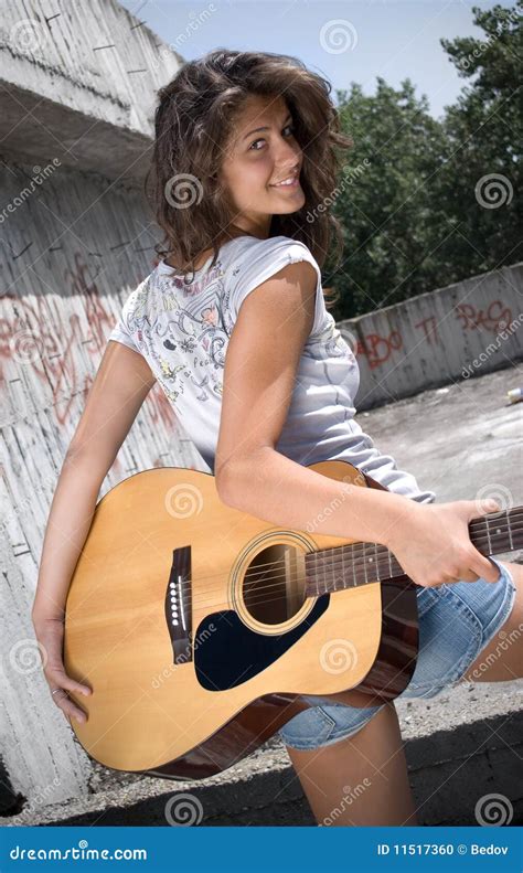 Girl Holding Guitar And Looking At Camera Stock Photo Image Of Girl
