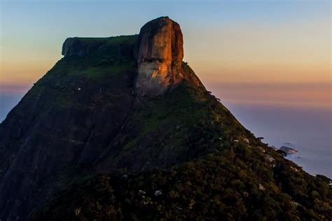 Located within the tijuca national park and passing through the atlantic forest, the trail is a steep ascent to the summit of the world's tallest coastal monolith. Pedra da Gávea, RJ | Dronestagram