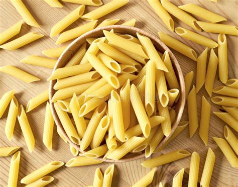Penne Pasta Or Macaroni In A Wooden Bowl Stock Photo Image Of Angle