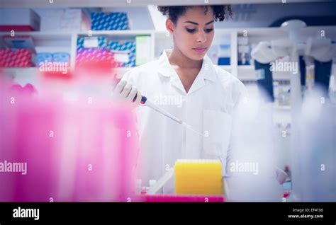 Pretty Science Student Using Pipette Stock Photo Alamy