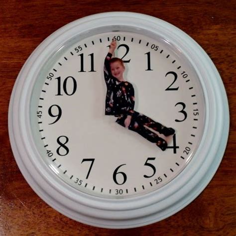 It's much more unique than a store bought version. DIY Custom Clock with Photo Hands - 24/7 Moms
