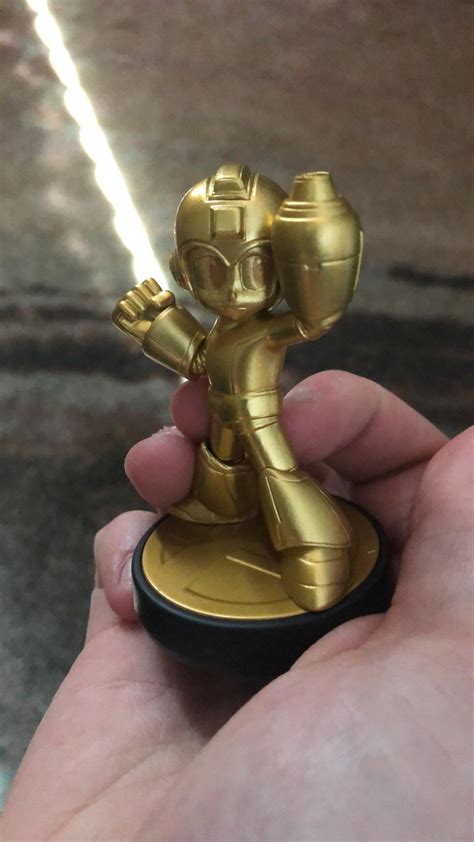 The amiibo acts like the regular mega man amiibo and is compatible with other games as well, such as super smash bros. AHHHH! I got Gold Mega Man for $35 on eBay! : amiibo