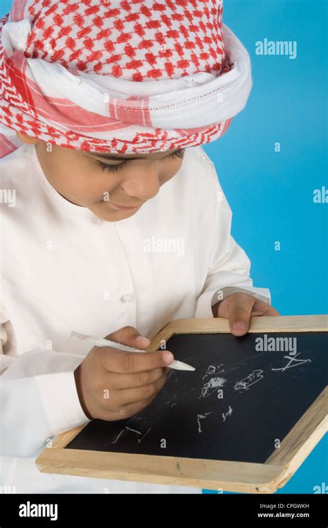 Arab Boy Writing Stock Photo Alamy