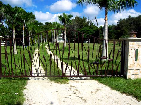 Affordable, automatic driveway gates & security fence handcrafted to your measurements. Custom Iron Driveway Gates Tampa, Florida | Metals & Nature