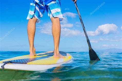 Stand Up Paddle Surfing In Hawaii — Stock Photo © Epicstockmedia 32589219
