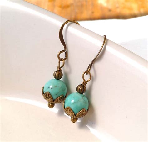 Turquoise Colored Magnesite Gemstone Earrings With Antiqued Brass