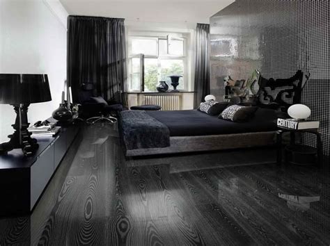 Dark wood flooring with pale blue panelling in a relaxing bedroom. Pin by Sean Hazlewood on My Style | Black laminate ...