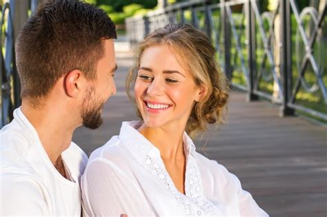 Premium Photo Loving Man And Woman In White Shirt Look At Each Other And Smiling Funny Couple